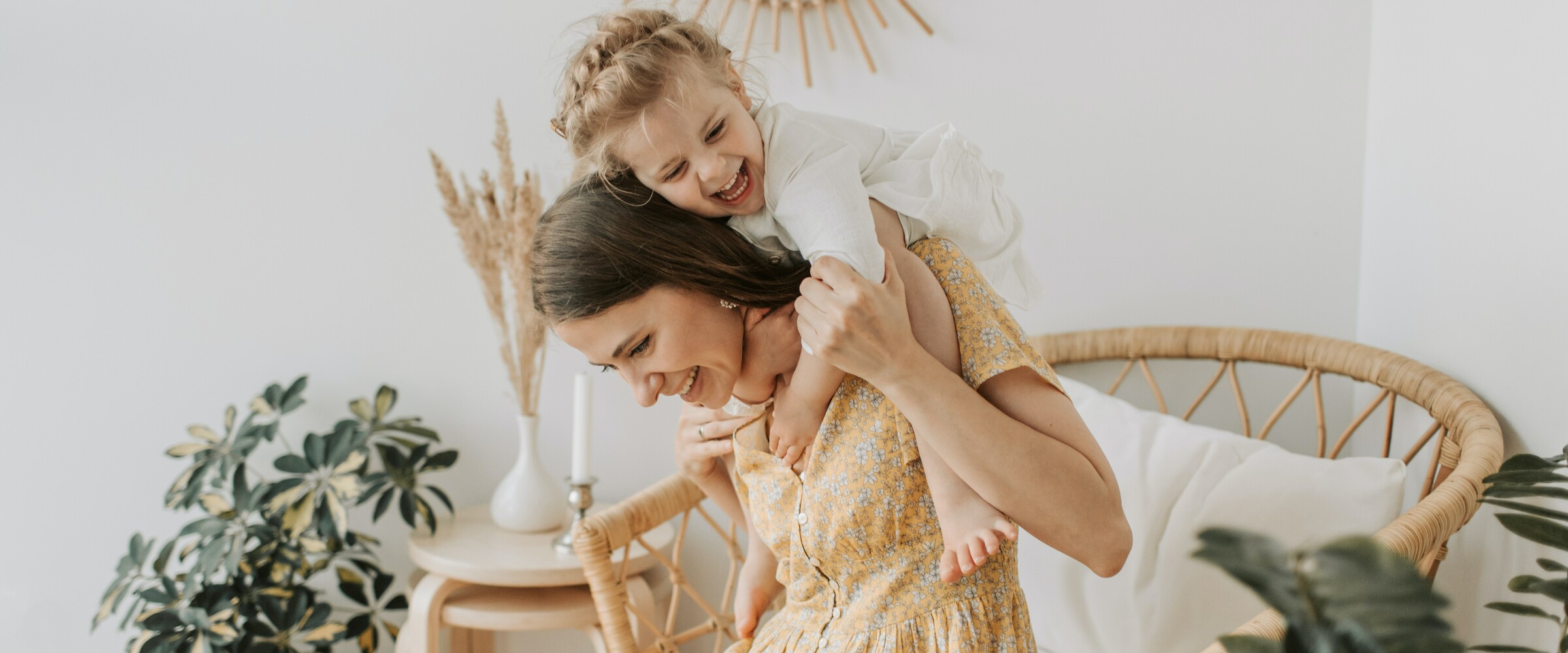 happy woman and child laughing